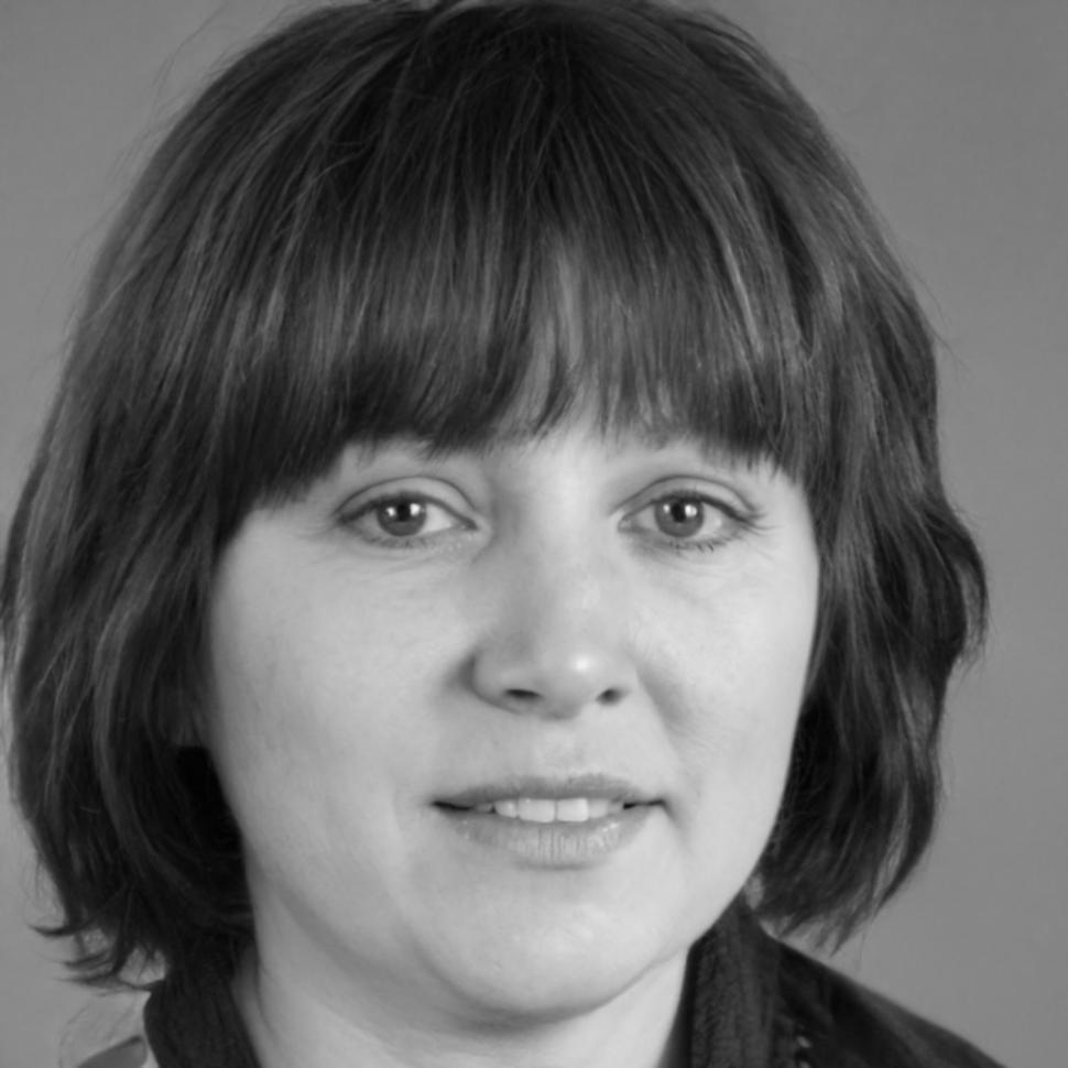 Team member portrait in modern workspace